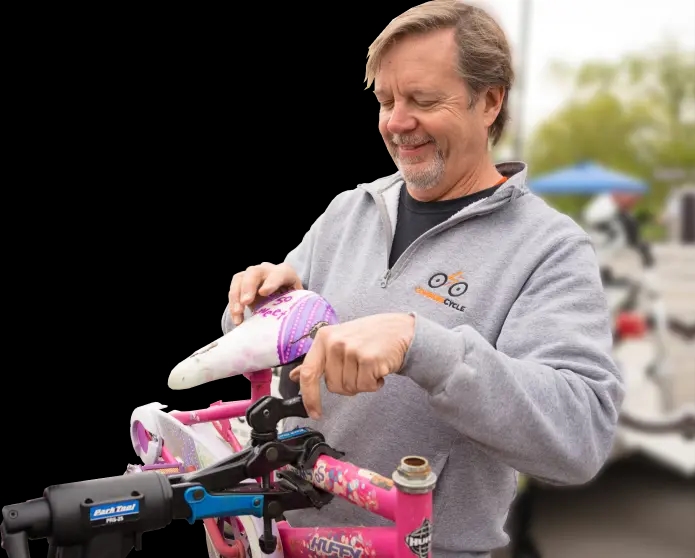 Lee Montanari fixing a bike