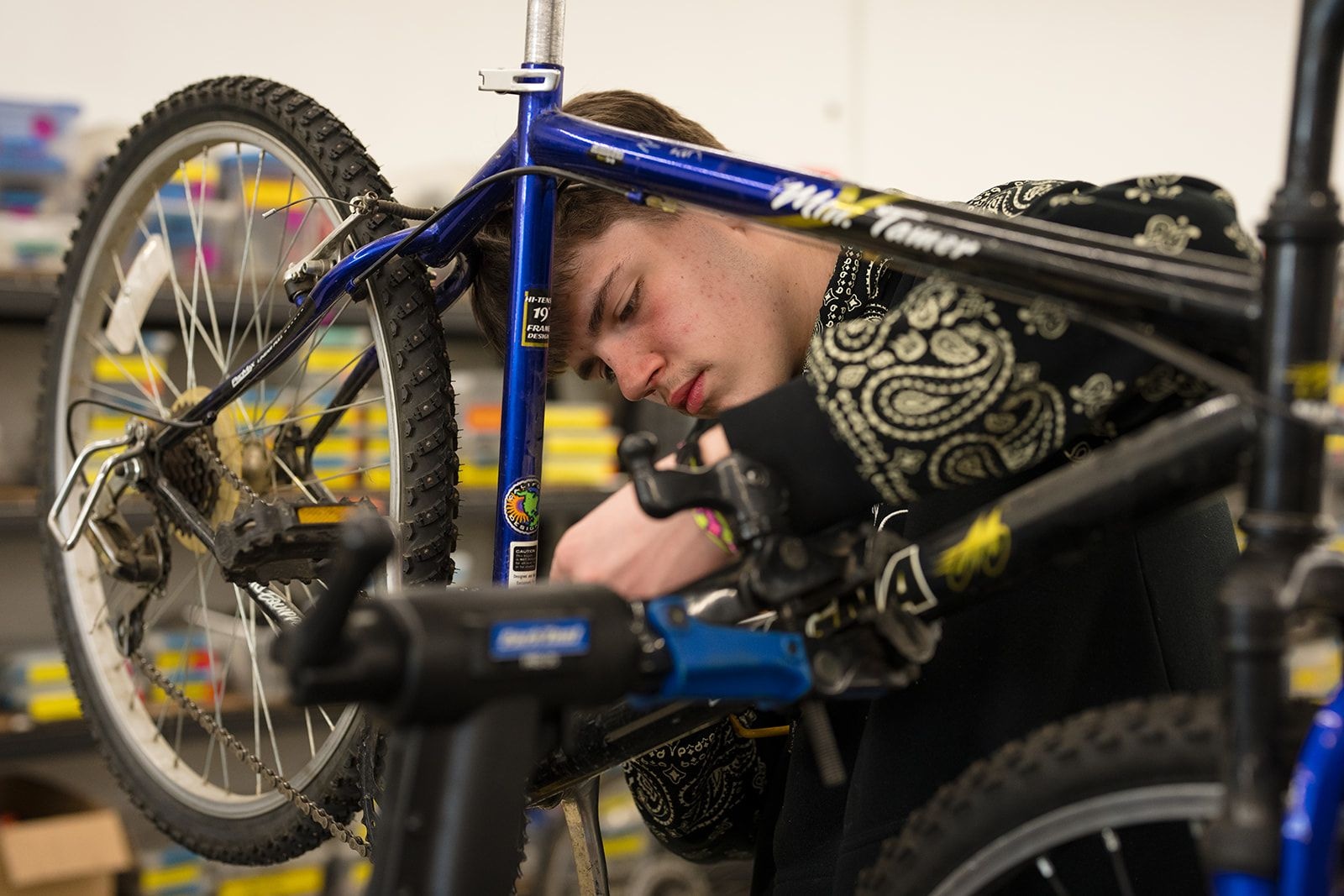 Neighbors working together on bikes